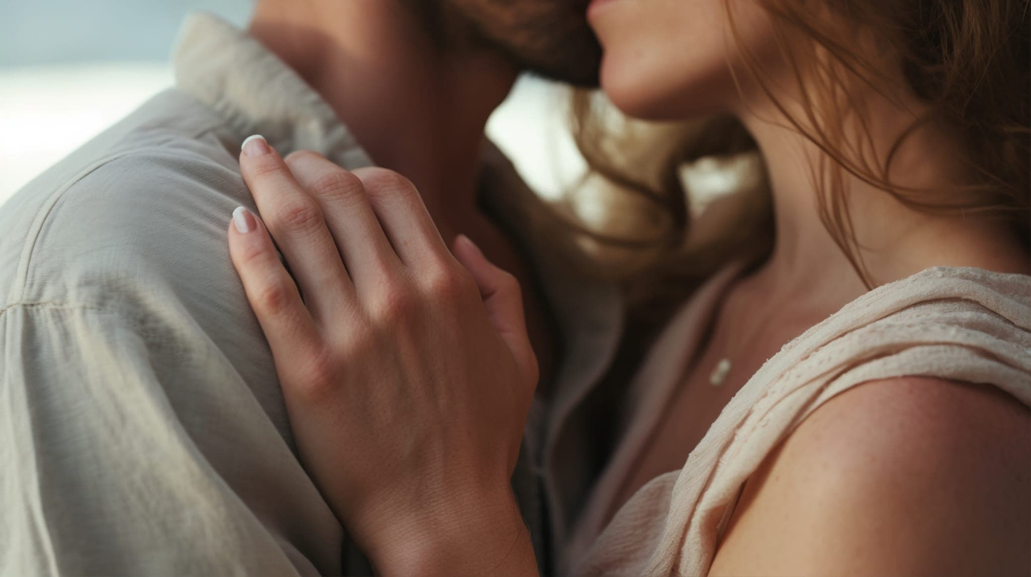 A couple in close, gentle embrace